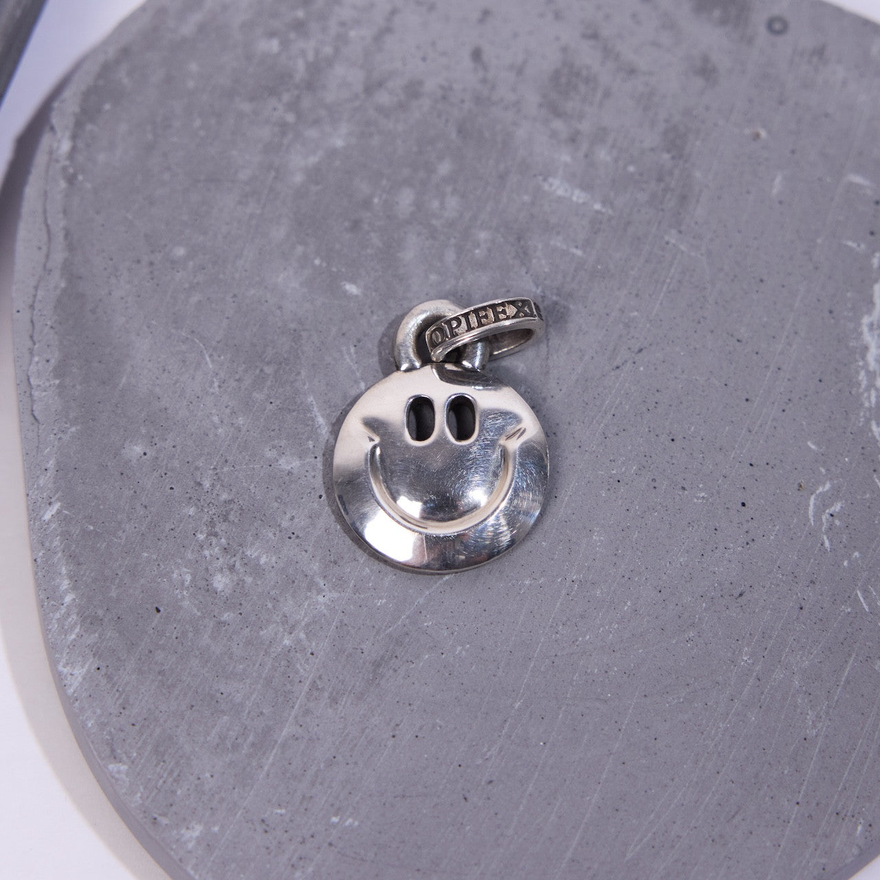 OPF | Flat-Faced Smiley Pendant